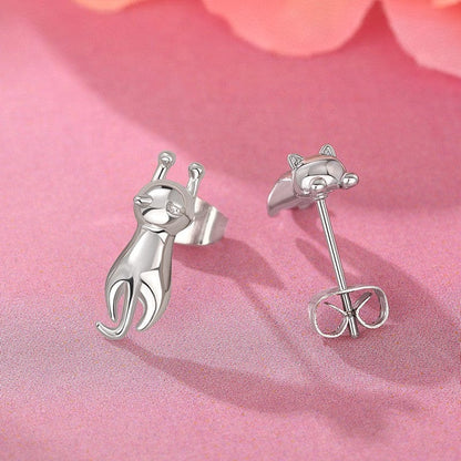 Aretes de gatitos colgando