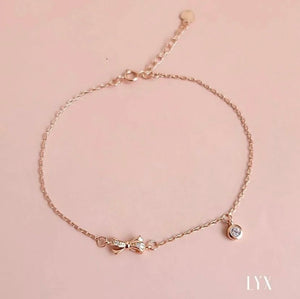 Pulsera de moño rosa