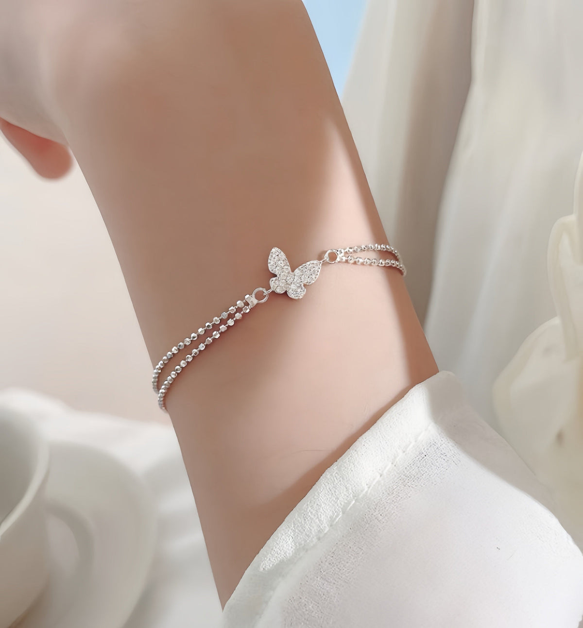 Pulsera doble mariposa